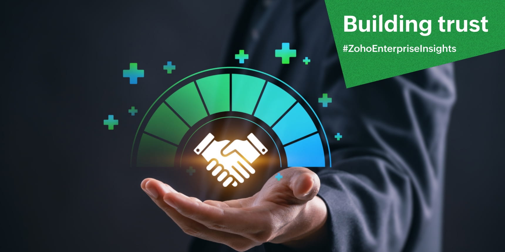 A business professional holds out their hand, displaying a glowing handshake icon surrounded by a semicircular gauge in green and blue tones, with small plus signs floating around it.