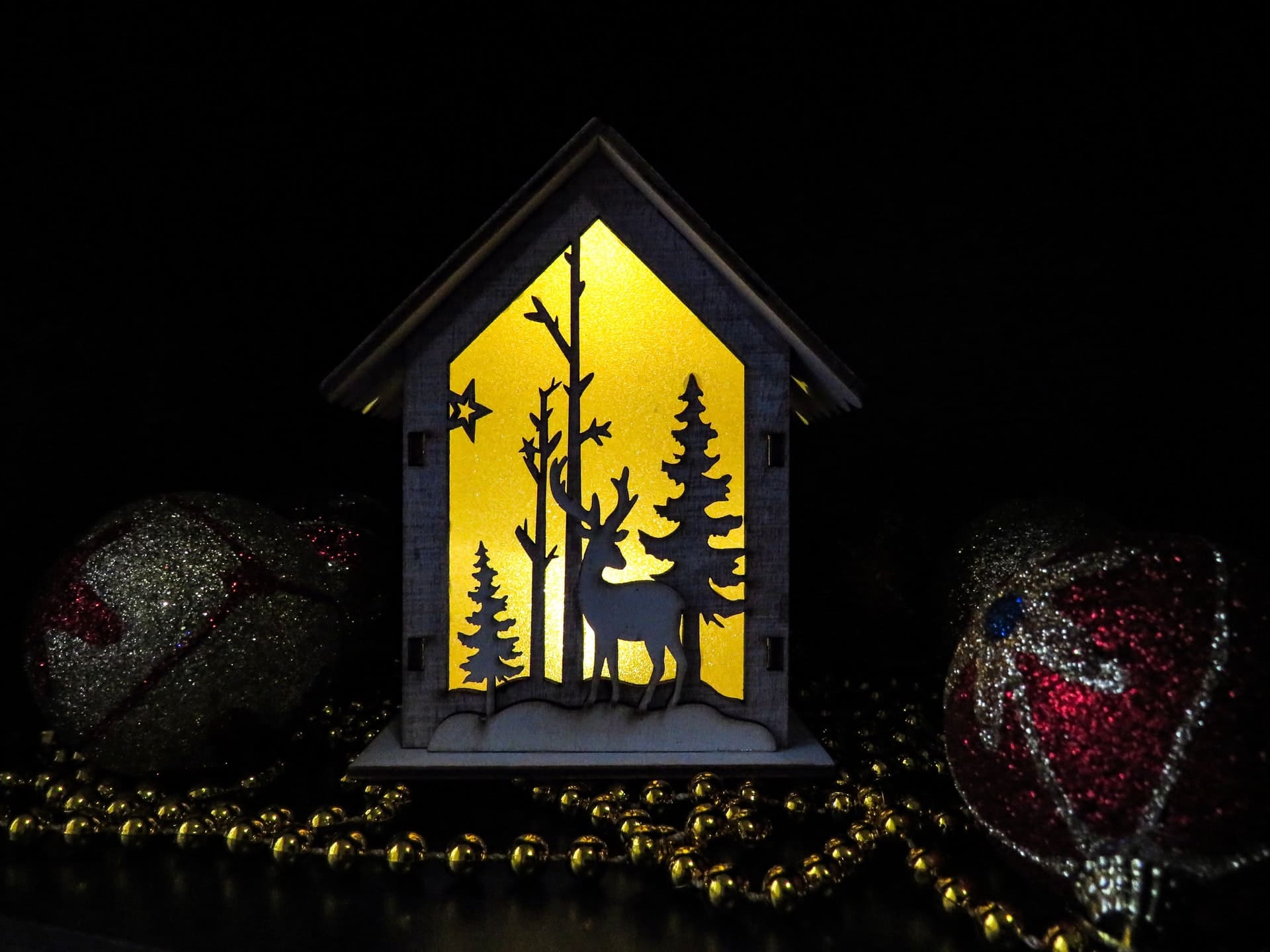 A decoration piece of a reindeer to symbolize the holiday season and the need for virtual parties