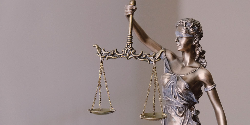 Lady justice holding up a scale